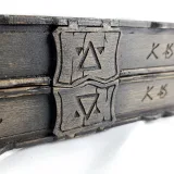 Magnetic clasp and rune engraving on the closed backgammon case