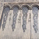 Dragon points engraved on the backgammon board, close-up