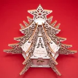 Christmas tree gift box seen from above at an angle, six lace fins spreading around the hexagonal center box