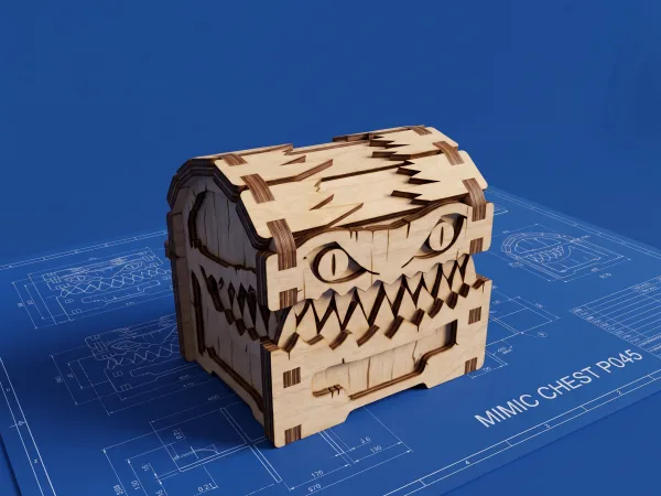 Parametric mimic chest laser cut from plywood, with engraved cracks, eyes and two rows of teeth, on a blueprint background
