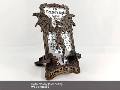Phone stand 00300 – gothic dragon phone stand holding a phone