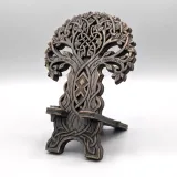 Layered Tree of Life phone stand with a phone ledge, angled view