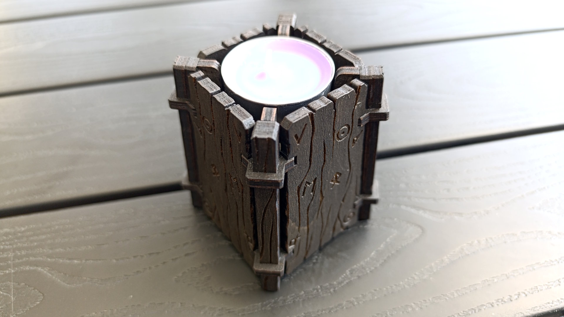 Handcrafted style votive with ancient symbols