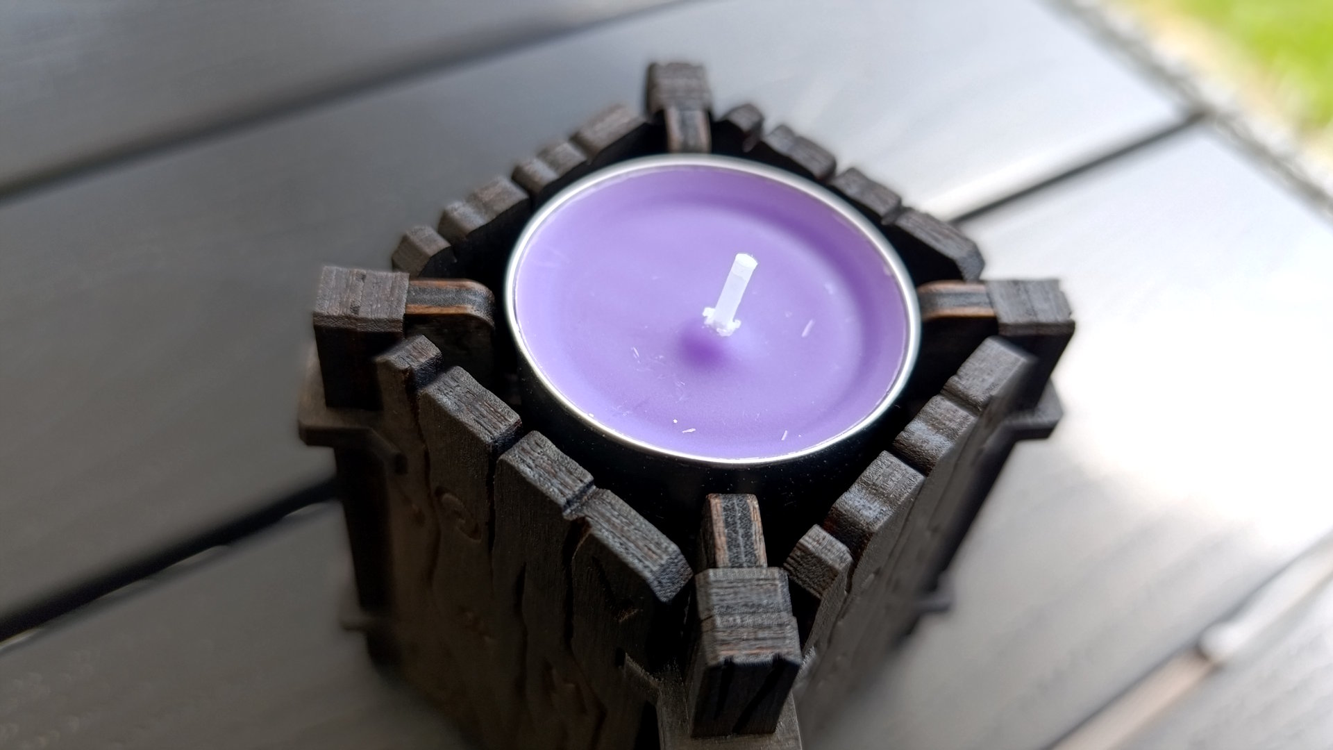 Wooden tea light holder assembled from laser-cut parts